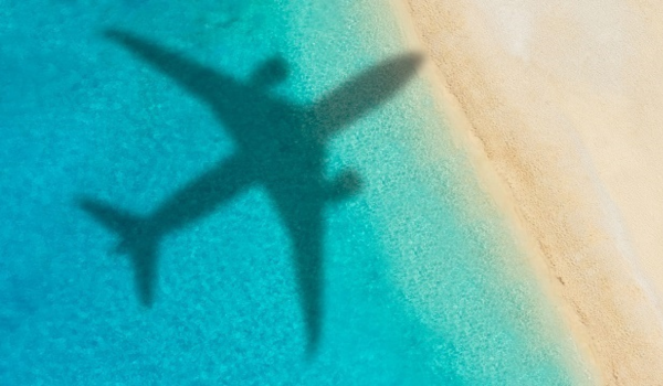 plane shadow in crystal clear water