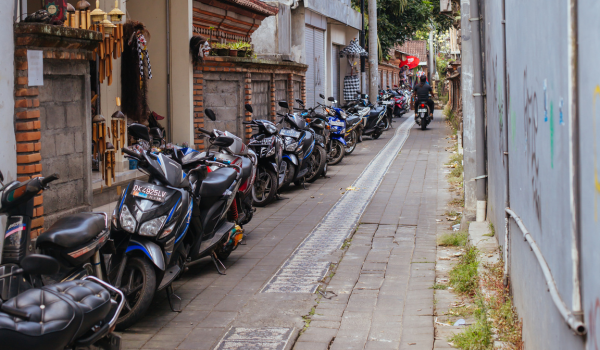 Ubud street lined with scooters