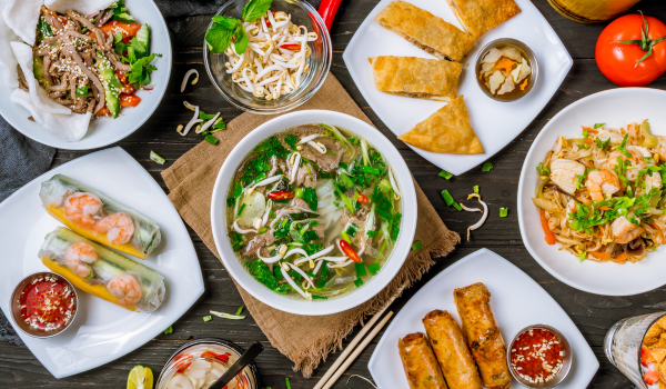 Different types of Vietnamese food on a table