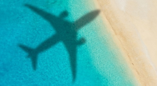 plane shadow in crystal clear water